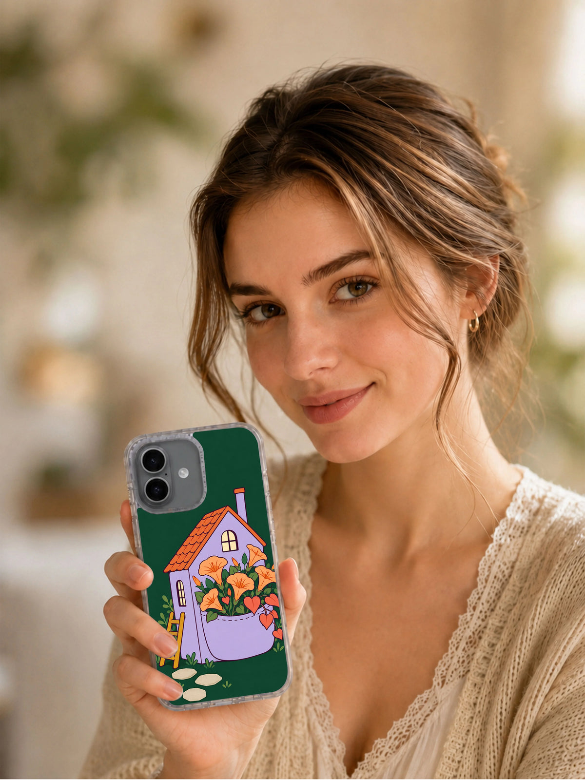 Lifestyle portrait showing A House with a Pocket Garden iPhone 17 case