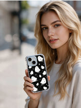 Person holding The Pocket Moon Watchers celestial iPhone 15 Plus case