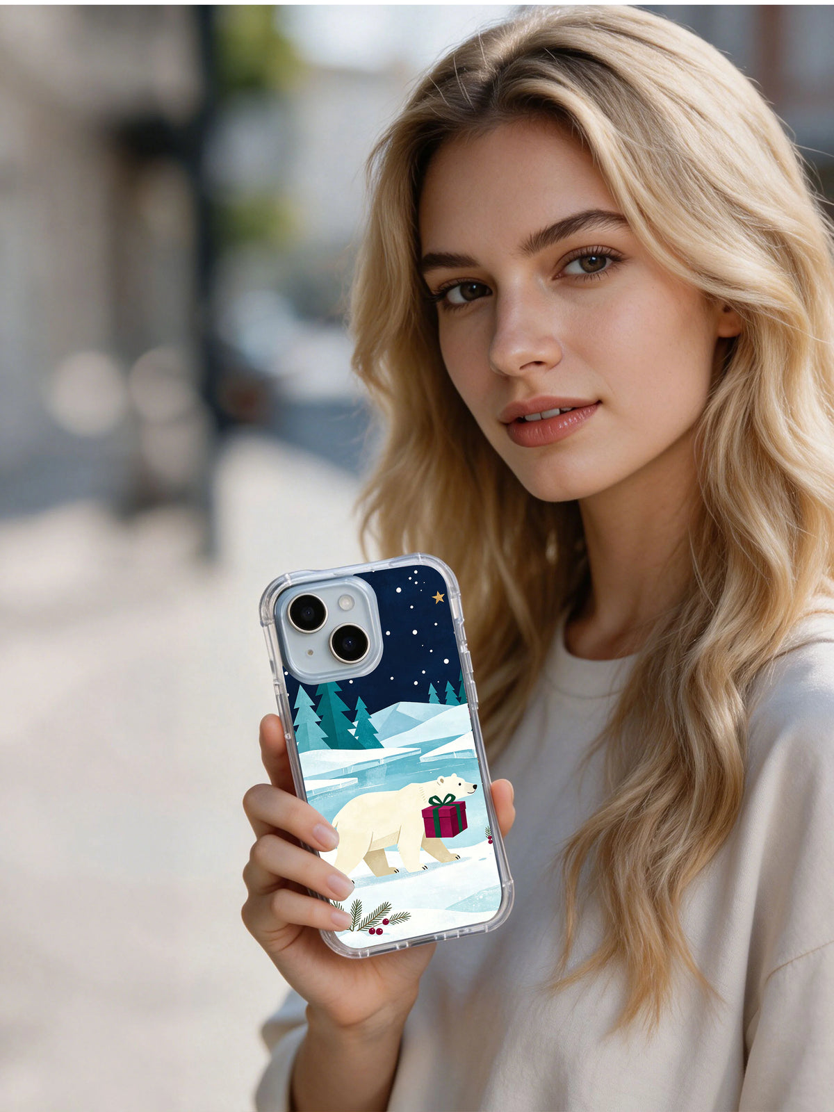 Person holding the polar bear Christmas parcel iPhone 14 case