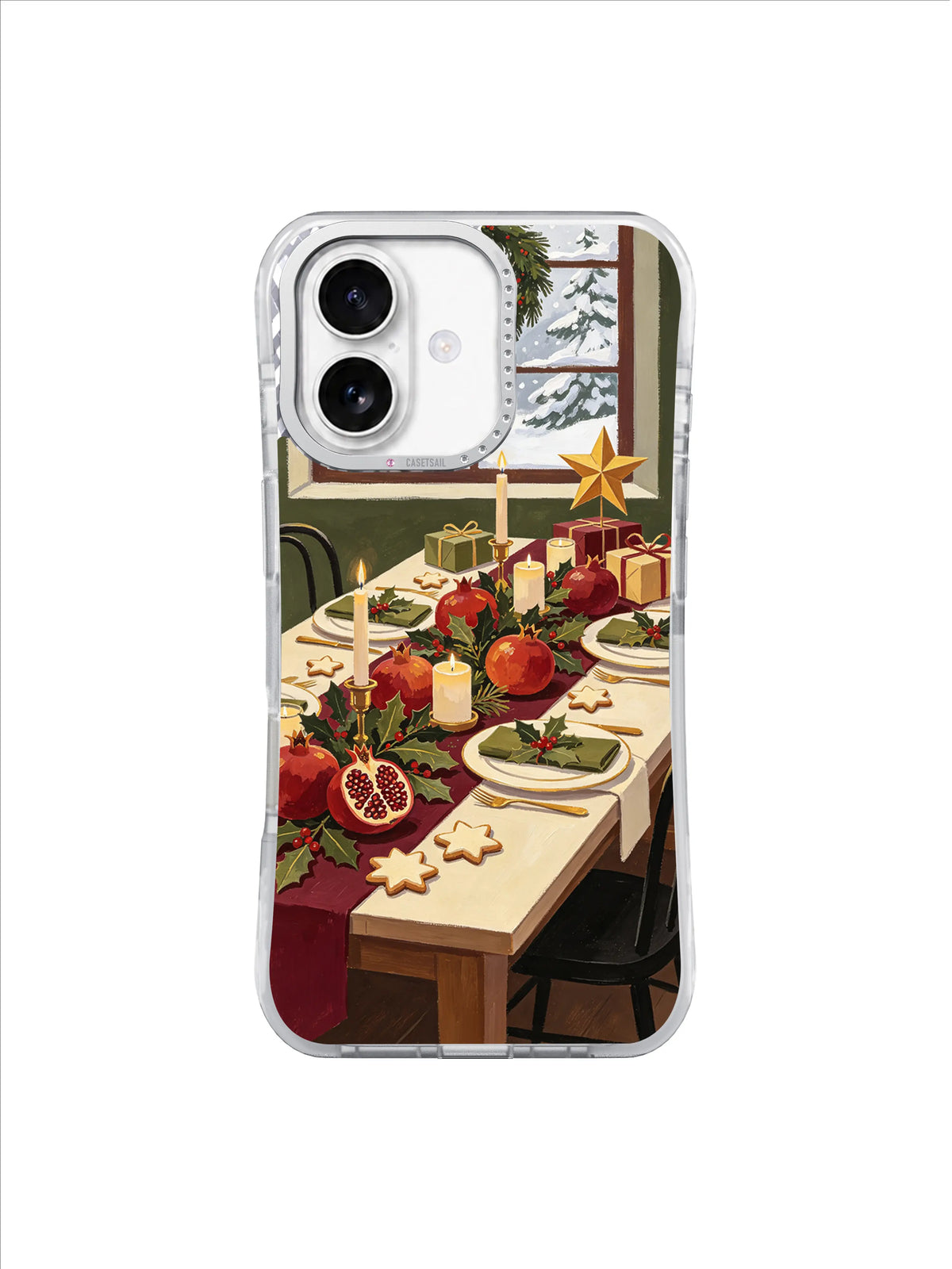 Golden paper star beside a pomegranate Christmas table and snowy window on an iPhone 17 case