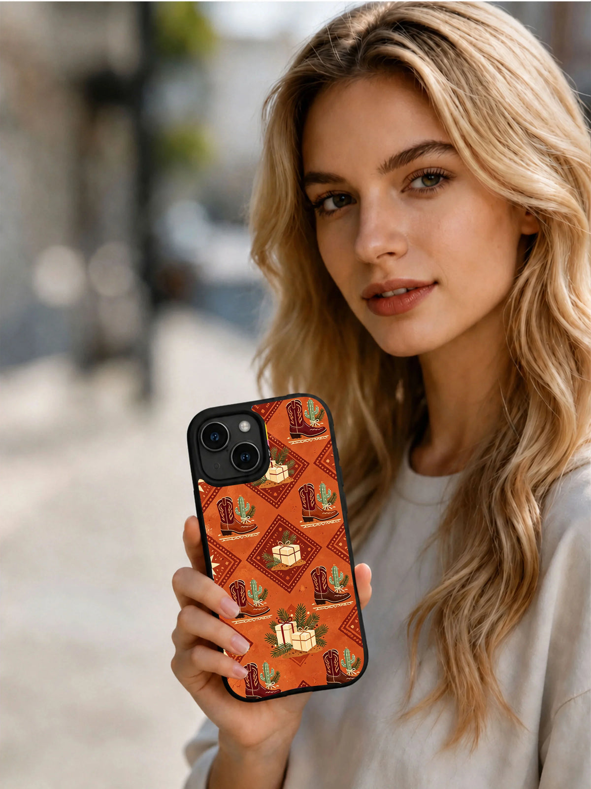 Prairie Christmas iPhone 15 case shown in a Western winter lifestyle scene