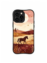 Prairie Moon Pony: A larger dark horse on a golden ridge with small distant conifers and stars in a peach sky.