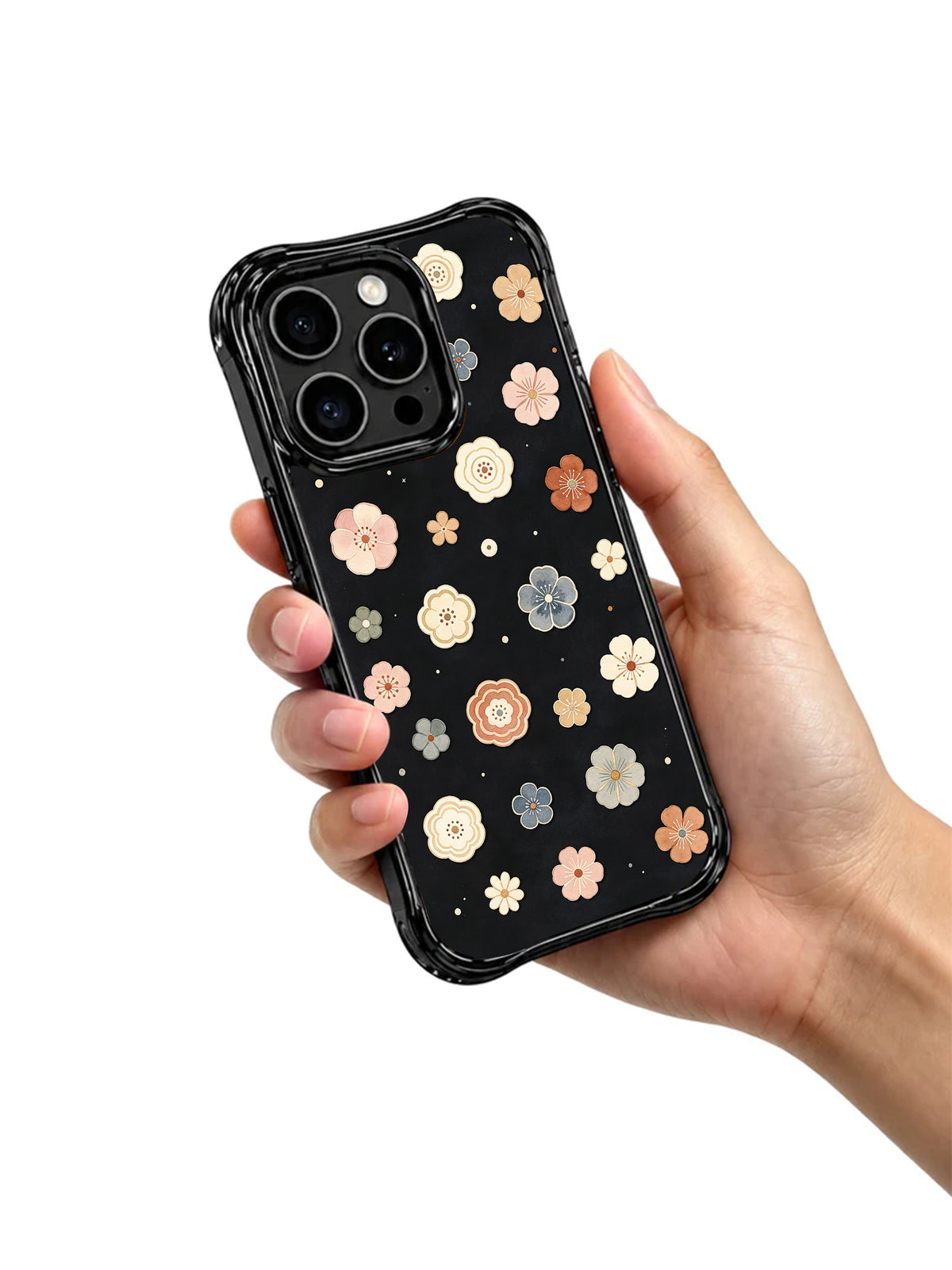 Quiet Floral Manuscript iPhone 15 Pro case held in hand