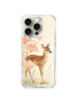 Quiet Peach Grove Fawn: A spotted fawn stands among large peach ginkgo leaves and delicate plants.