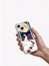 Hand holding the Rabbit and Christmas Moon iPhone 14 case
