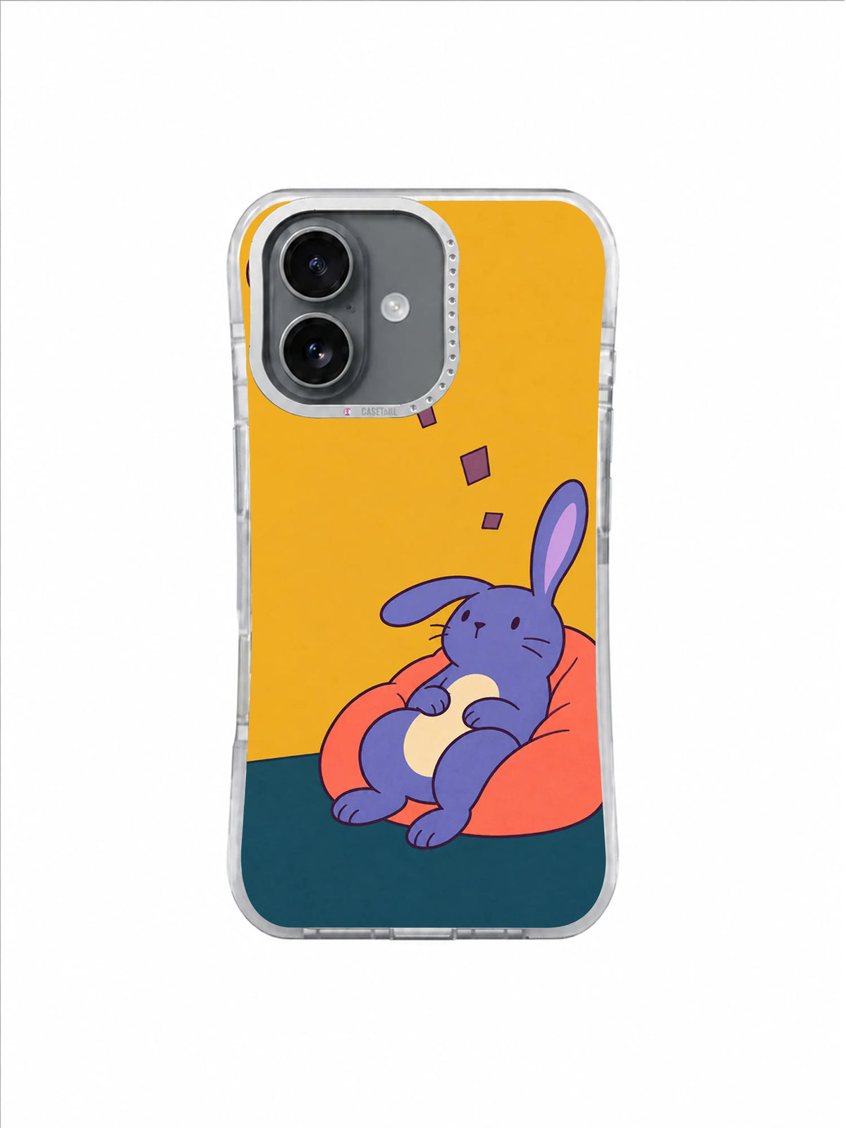 Small relaxed rabbit pausing on a coral cushion above a deep teal floor