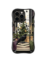 Raven Christmas iPhone 15 Pro case with oxblood gifts, black ornaments and evergreen