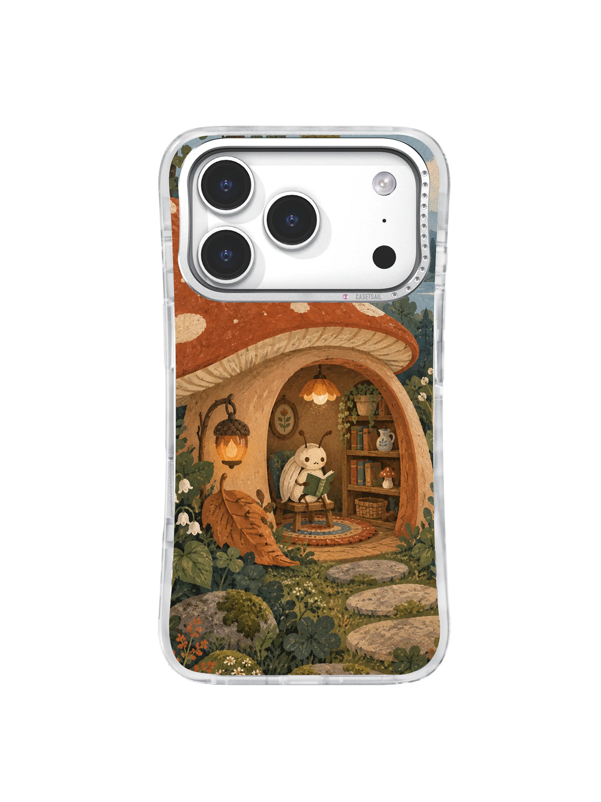 Cream beetle reading an olive miniature book inside a mushroom house on an iPhone 17 Pro case