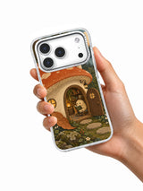 Hand holding the Reading Room Under the Cap white iPhone 17 Pro case