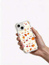 Ribbon Goose Harvest Charm: Hand holding the case with its illustrated back facing outward.
