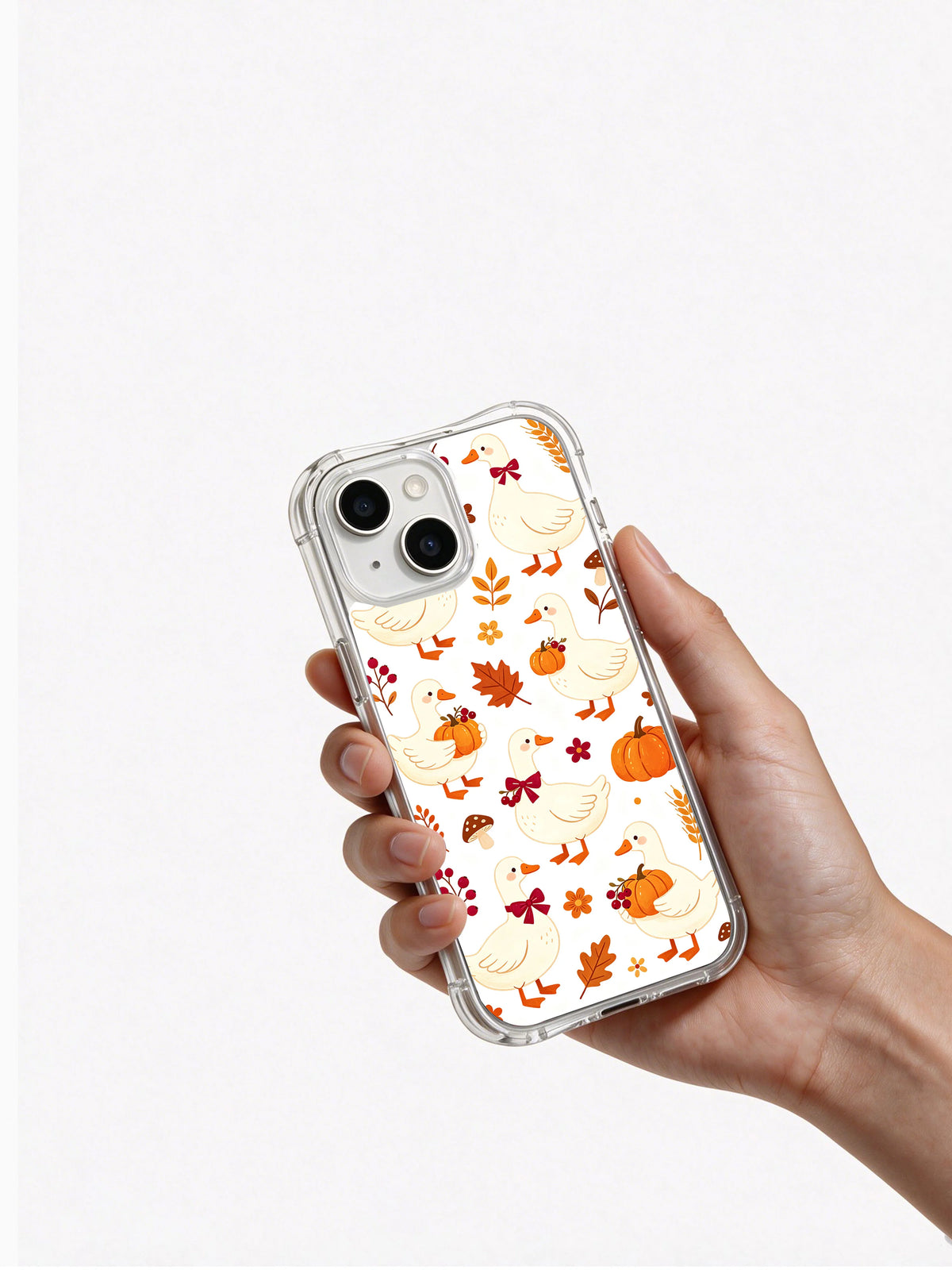 Ribbon Goose Harvest Charm: Hand holding the case with its illustrated back facing outward.