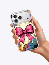 Hand holding the Ribbon Heart Explosion coquette pop-art iPhone case