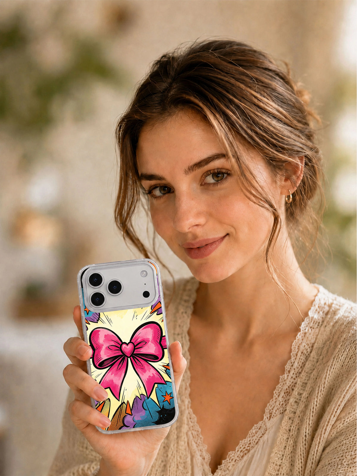 Lifestyle view of the Ribbon Heart Explosion pink ribbon iPhone case