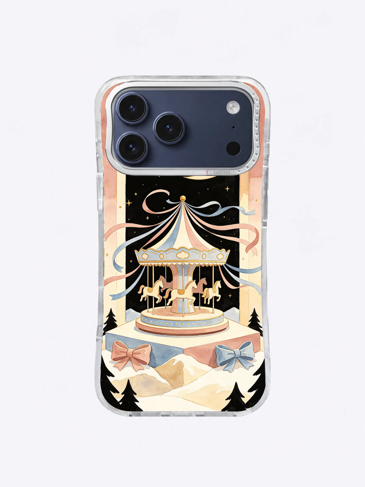 Powder Blue Ribbon Carousel artwork on an iPhone 17 Pro Max case with bows, snow terraces, and pine trees