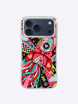 Polka-Dot Heart Rocket artwork on an iPhone case with a red bow, heart details, dotted pink panels, ribbon exhaust, orbit circles, and snow crystals