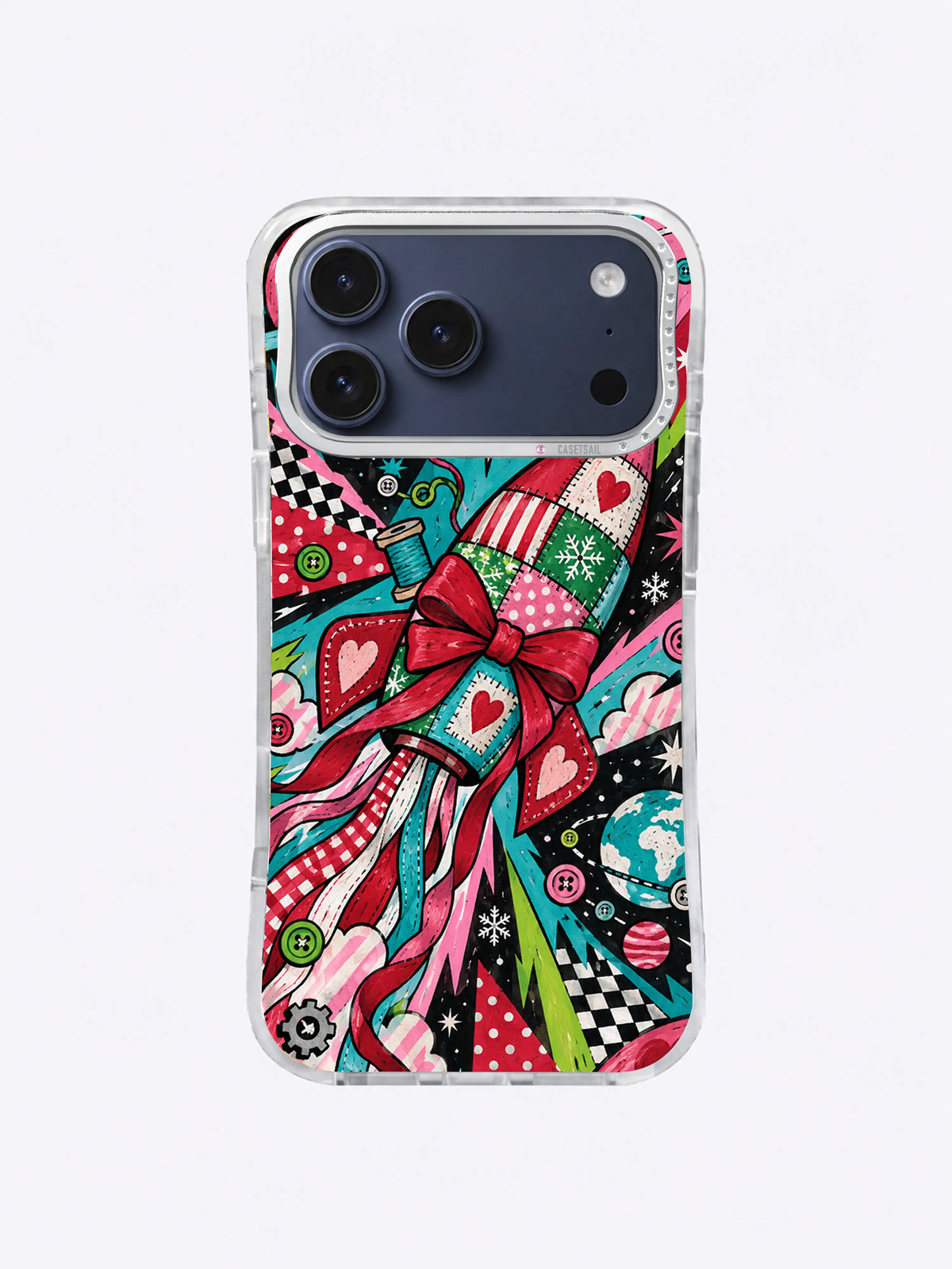 Turquoise Ribbon Flight artwork on an iPhone case with a diagonal bow rocket, curling ribbons, planets, gears, green accents, and patterned wedges