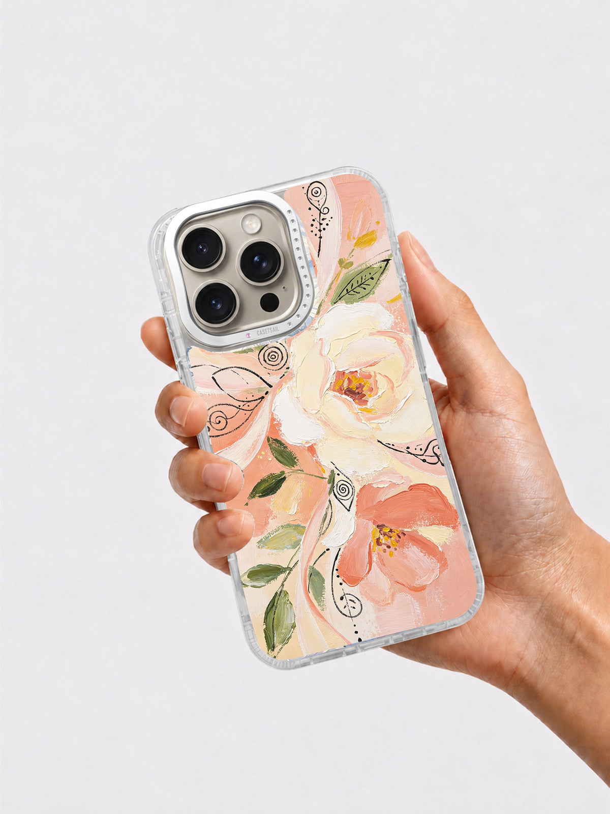 Hand holding romantic floral iPhone 16 Pro case