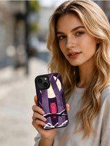 Lifestyle view of a person holding the Rose Owl Night iPhone 13 case with pink owl and purple moonlit forest art