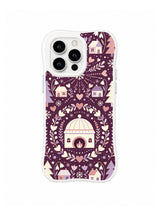 Roundel Snow Cottage folk art iPhone 13 Pro case with snowflakes and botanical hearts
