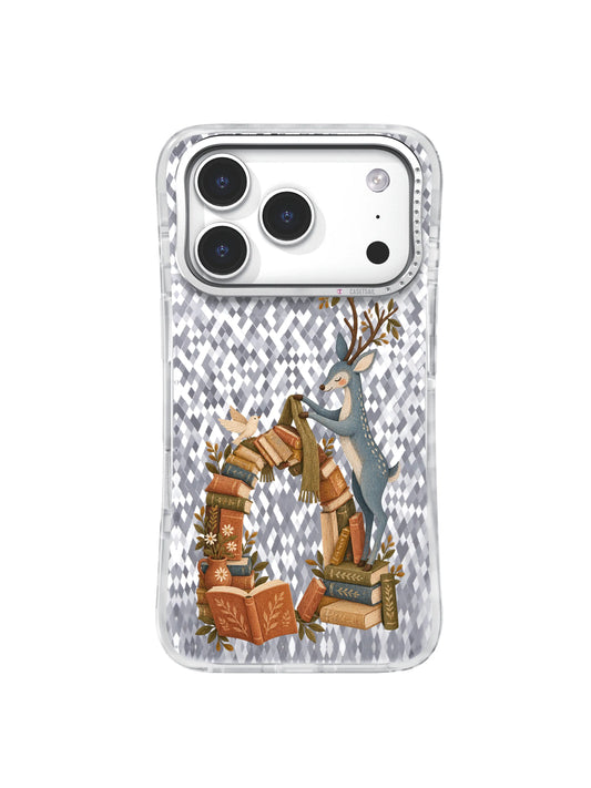 Dusty-blue deer lifting an olive scarf over an arch of books on an iPhone 17 Pro case