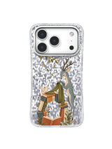 Slender blue deer returning an olive scarf to a leaning book arch on an iPhone 17 Pro case