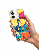 Hand holding a transparent iPhone 17 Pro case with the heron ice-cream artwork