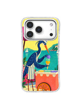 Heron steadying a three-scoop cone in the sea breeze beneath a magenta parasol on an iPhone 17 Pro case