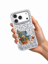 Transparent A Seat Saved for You iPhone 17 Pro case held in one hand.