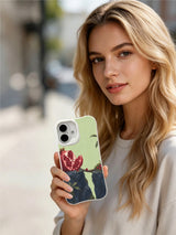 Seeds Across the Crack pomegranate iPhone 16 case lifestyle scene