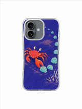 Coral-red crab following a curved turquoise shell trail on an ultramarine-violet iPhone 17 case