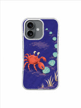 Playful crab nudging a shell path around soft sand in a coastal gouache iPhone 17 case illustration