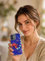 Lifestyle portrait holding the Sideways Is a Direction crab art iPhone 17 case