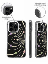 Close-up of crystal-accented raised camera frame on black abstract floral case