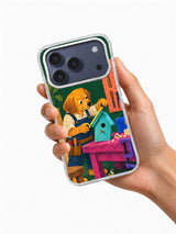 Hand holding a transparent iPhone 17 Pro case with the colorful birdhouse workshop artwork
