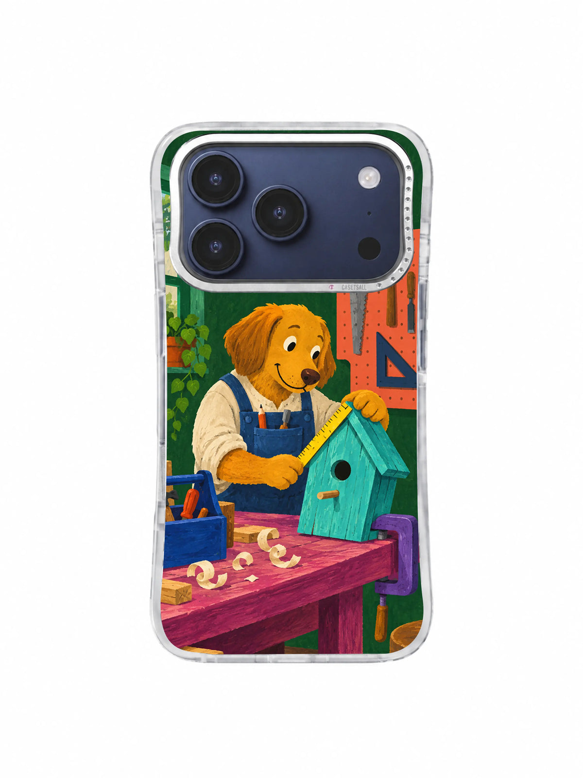 Dog carpenter beside cream wood curls and a turquoise birdhouse on an iPhone 17 Pro case