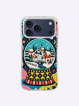 Front product view of Snow Globe Town artwork on a clear iPhone 17 Pro Max case
