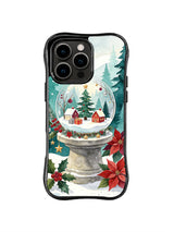 Snowy village snow globe artwork on a black iPhone 16 Pro case