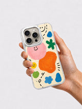 Hand holding playful abstract iPhone 16 Pro case