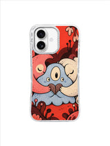 Round blue character sheltered between coral and ivory friends on a red floral ground