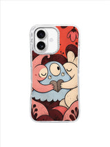 Icy-blue friend centered in a soft coral and cream hug with burgundy flowers
