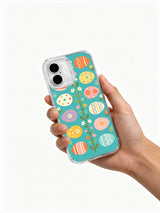 Spring Candy Eggs: Hand holding the case with its illustrated back facing outward.