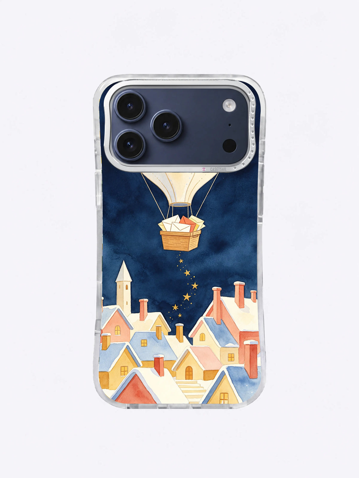 Star Post Balloon iPhone case pattern with a cream seed-pod balloon above a snowy coral and blue village