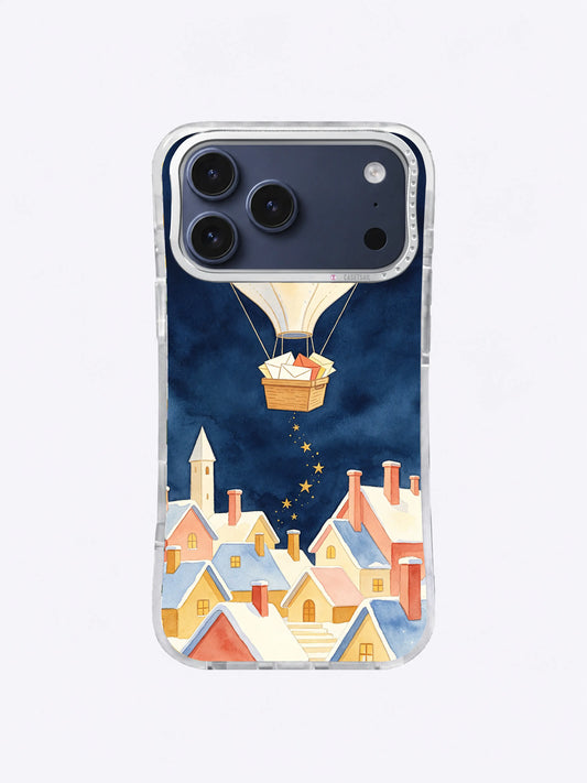 Star Post Balloon iPhone case pattern with a cream seed-pod balloon above a snowy coral and blue village