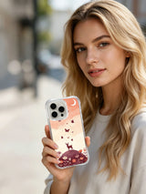 Starlit Butterfly Hill: A person holding the illustrated case outdoors.