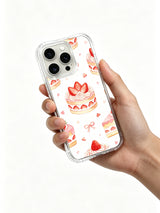 Strawberry Cake Birthday Party: Hand holding the case with its illustrated back facing outward.
