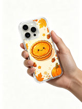 Sunlit Pie Festival: A hand holding the illustrated case.
