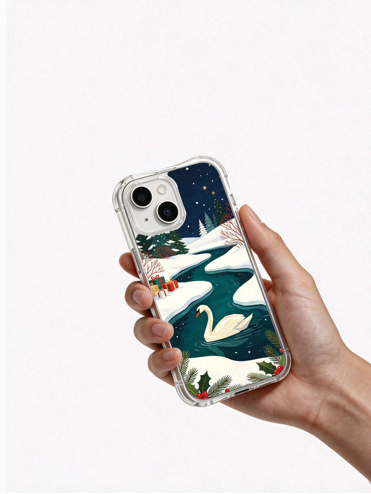 Hand holding the clear-edge Swan's Christmas Lake iPhone 14 case