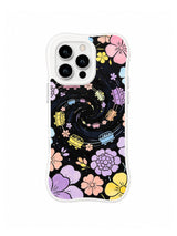 Bloom Carousel Night Ride: A winding circular band and small multicolor motifs sit among pastel flowers on black.