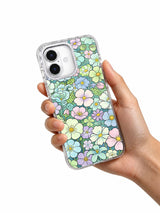 Sweet clover flower art iPhone 17 case held in hand