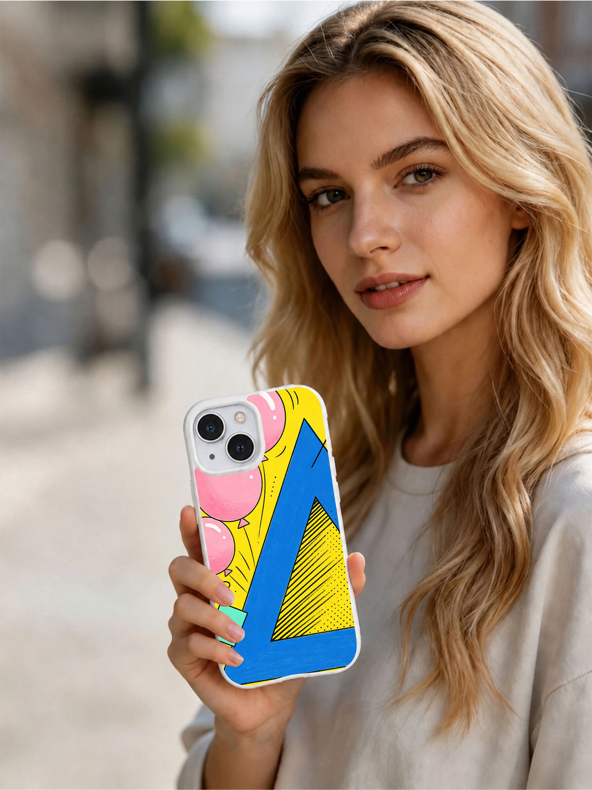 Festival of Angles iPhone 15 case hand-held view